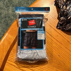 Hanes tag less boxers.  New In package. 5 in package, size M 32-34”